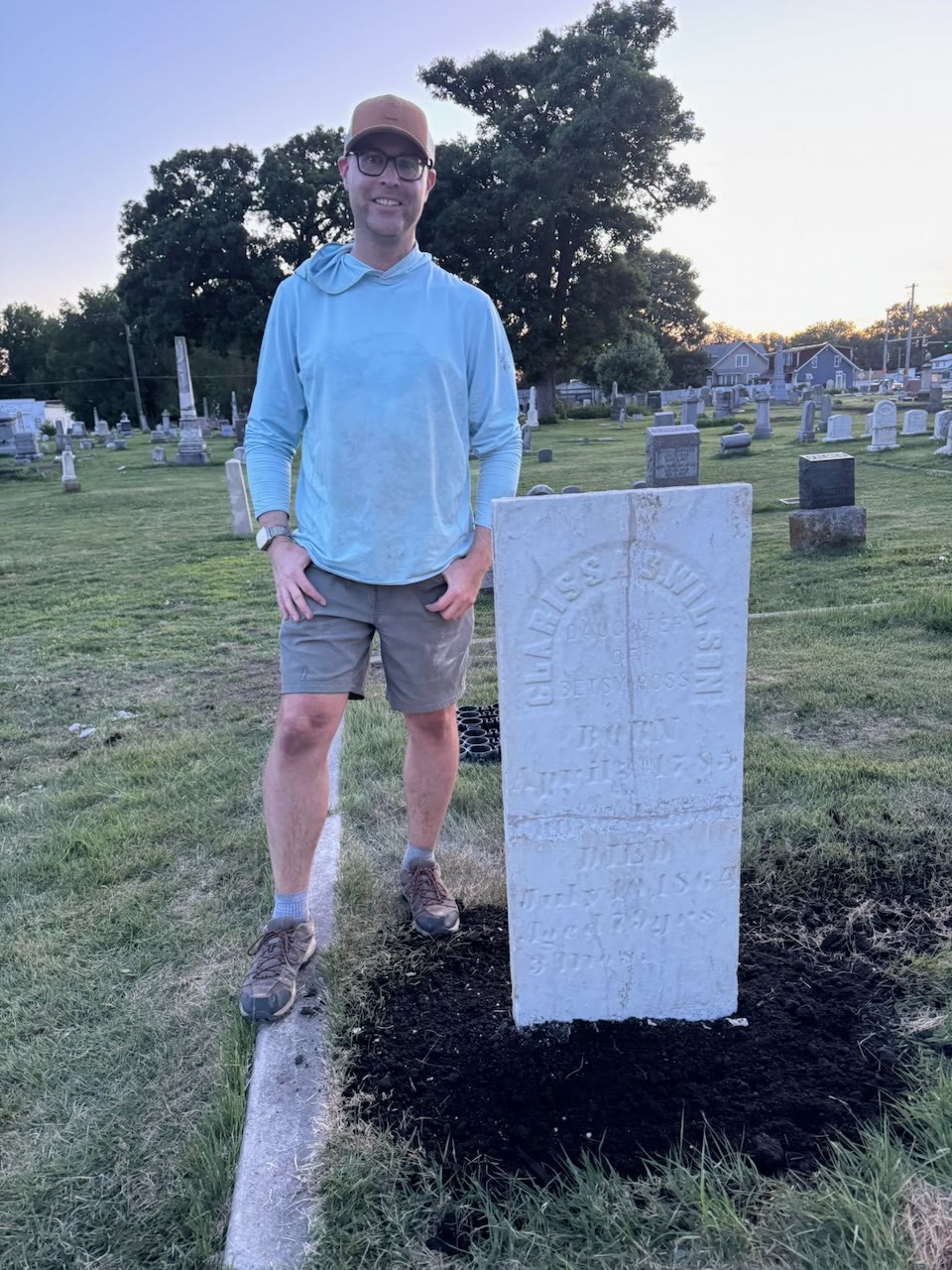 The finished tablet of Clarissa Wilson reset in fresh soil at dusk