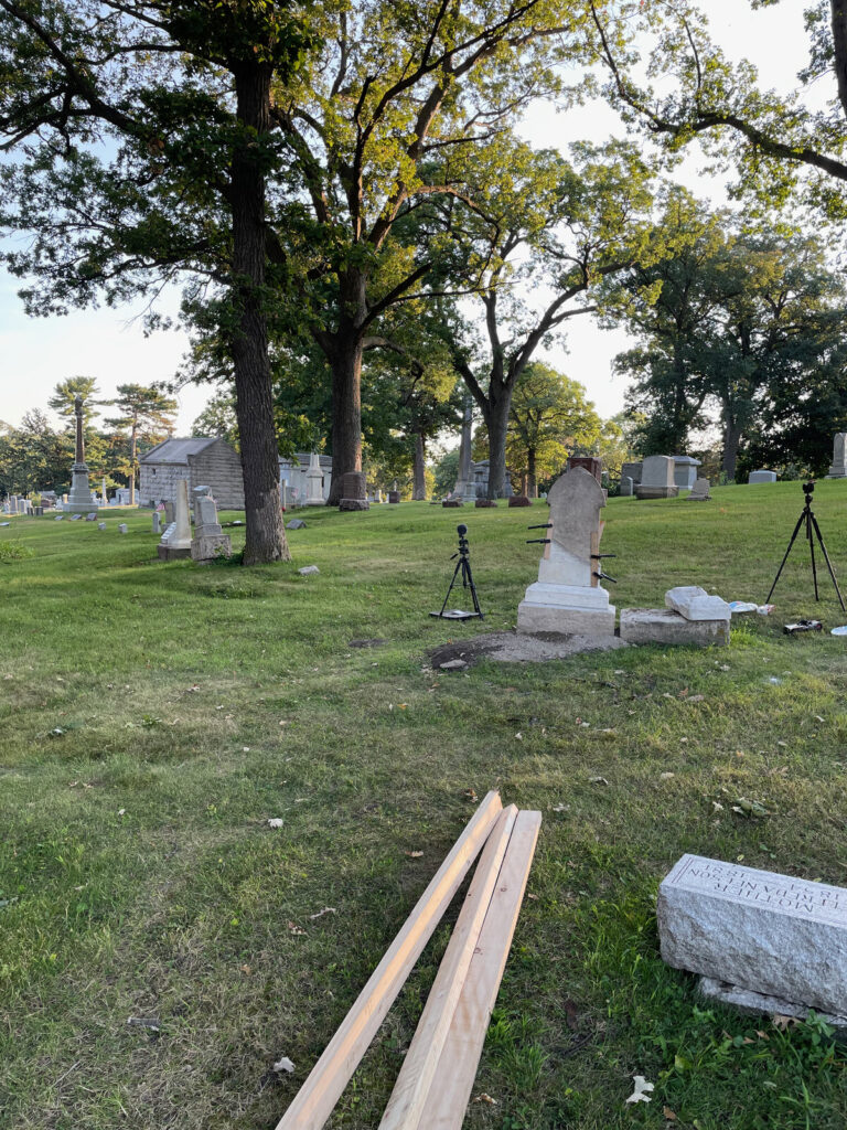 Cameras on tripods around the monument for photogrammetry